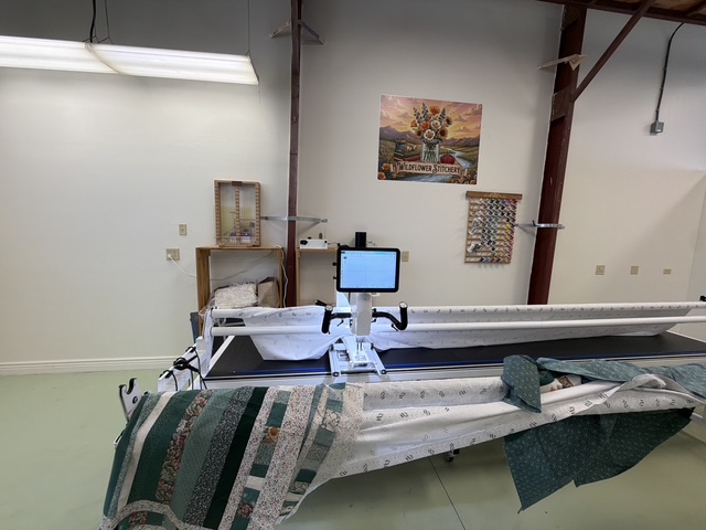 Long arm quilter at Wildflower Stitchery